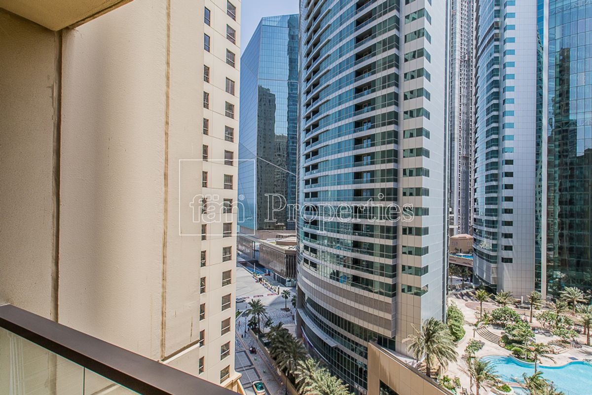 Unfurnished w Kitchen Appliances I Pool View-7