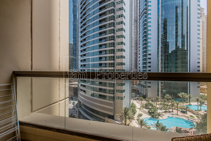 Unfurnished w Kitchen Appliances I Pool View-8